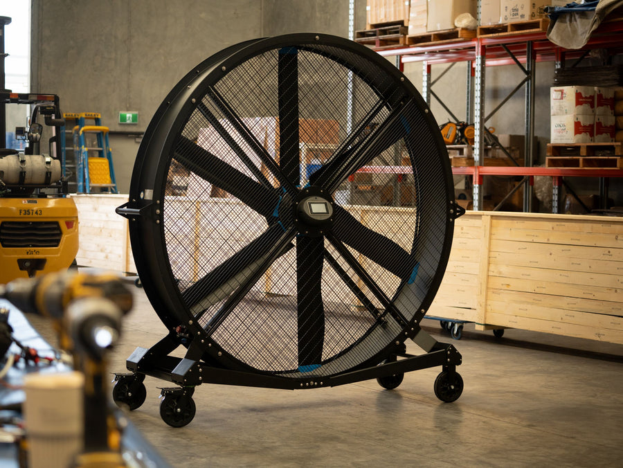 Switchblade fan three-quarter view in a warehouse