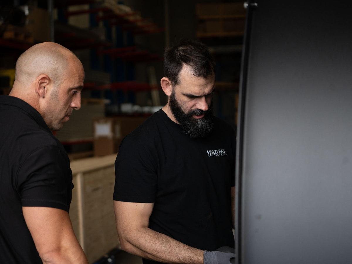 Holdfast Industries team inspecting a Switchblade fan